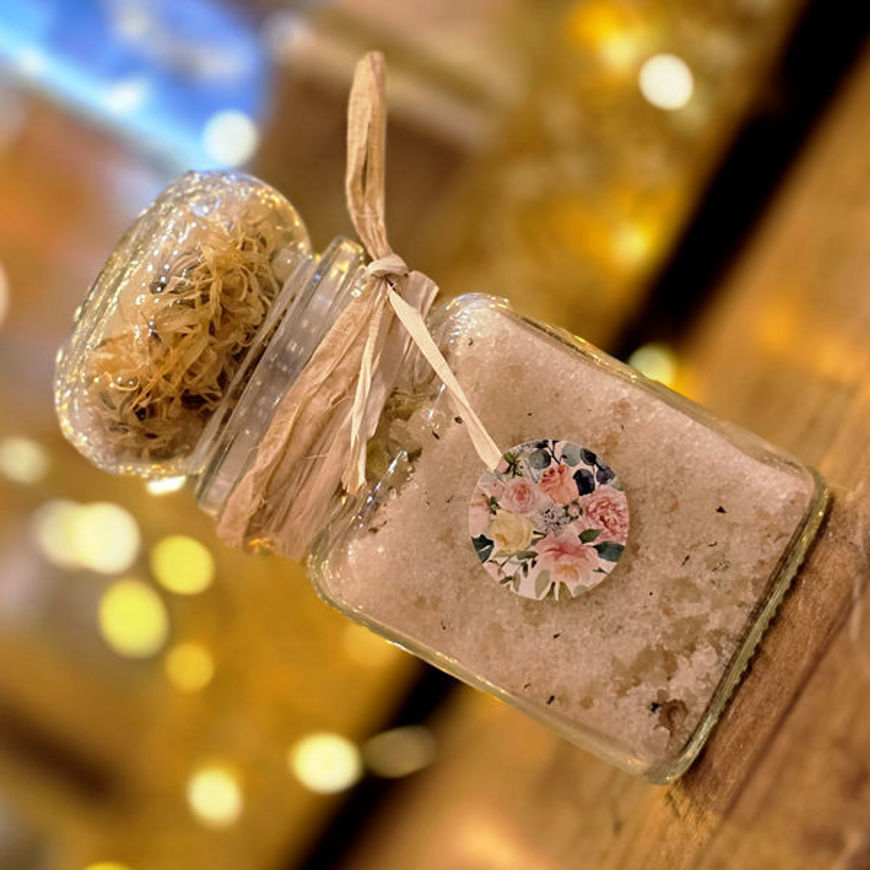 Bergamot Bliss bath salts with citrus oils, calendula, chamomile, and mint in a refreshing mineral blend.