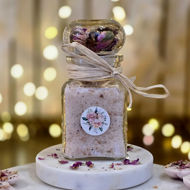 Sensual Rose bath salts with rose petals and a luxurious floral aromatherapy blend.